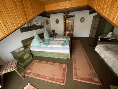 Ein Bett oder Betten in einem Zimmer der Unterkunft Ferienwohnung Jägersruh