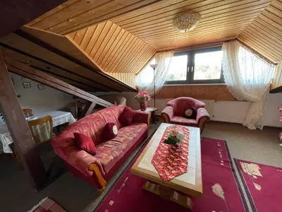 Ein Sitzbereich in der Unterkunft Ferienwohnung Jägersruh