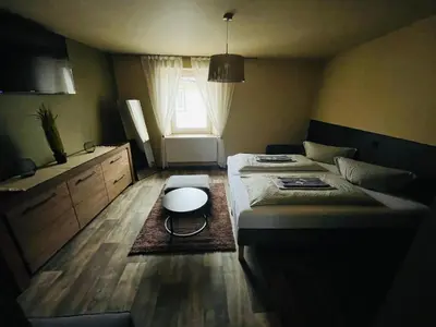 Ein Bett oder Betten in einem Zimmer der Unterkunft Familien-Apartments Boulevard