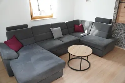 Ein Sitzbereich in der Unterkunft Ferienwohnung Sebald