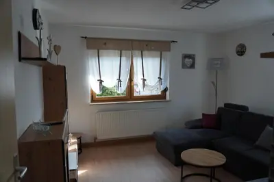 Ein Sitzbereich in der Unterkunft Ferienwohnung Sebald