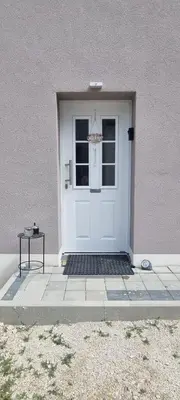 Eine Fassade oder ein Eingang zu gemütliche Ferienwohnung Achteltal