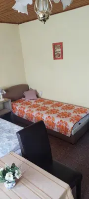 Ein Bett oder Betten in einem Zimmer der Unterkunft Pension Fischer Alte Windmühle