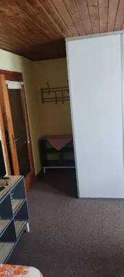 Ein Bett oder Betten in einem Zimmer der Unterkunft Pension Fischer Alte Windmühle