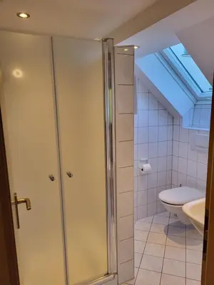 Ein Badezimmer in der Unterkunft Pension am Wald