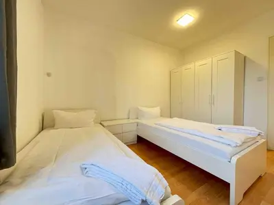Ein Bett oder Betten in einem Zimmer der Unterkunft SWF122 Gemütliche Monteurwohnung Übergangswohnung