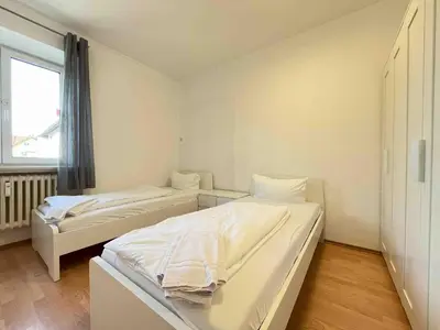 Ein Bett oder Betten in einem Zimmer der Unterkunft SWF122 Gemütliche Monteurwohnung Übergangswohnung