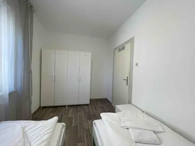 Ein Bett oder Betten in einem Zimmer der Unterkunft SAD242 Große Monteurwohnung Übergangswohnung