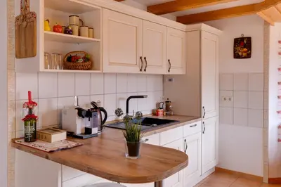 Küche/Küchenzeile in der Unterkunft Ferienhaus zur Thusstrasse