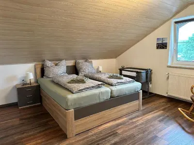 Ein Sitzbereich in der Unterkunft Ferienwohnung Zur Ochsenweid