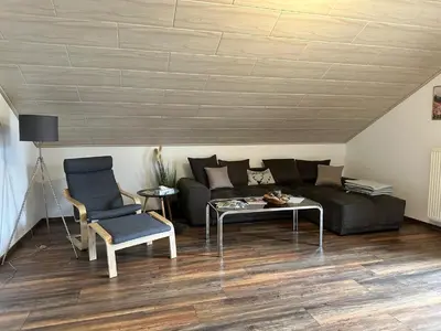 Ein Sitzbereich in der Unterkunft Ferienwohnung Zur Ochsenweid
