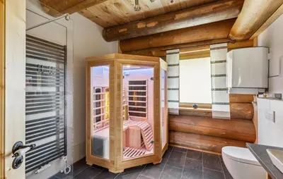 Ein Badezimmer in der Unterkunft Blockhaus Chalet