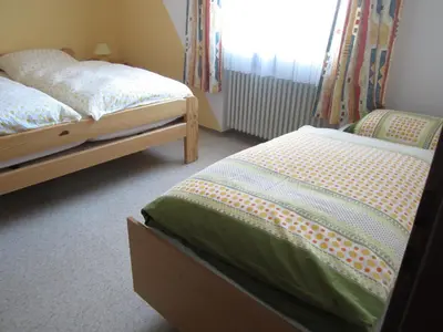 Ein Bett oder Betten in einem Zimmer der Unterkunft Ferien auf dem Bauernhof