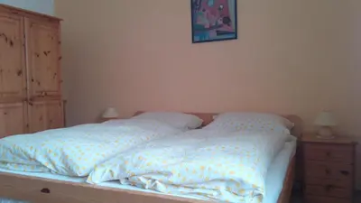 Ein Bett oder Betten in einem Zimmer der Unterkunft Ferien auf dem Bauernhof