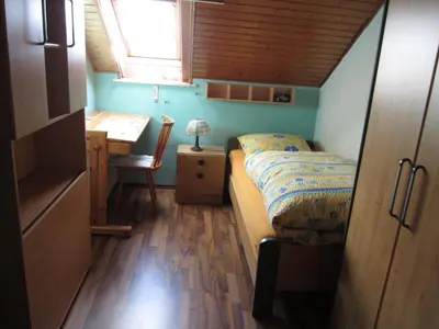 Ein Bett oder Betten in einem Zimmer der Unterkunft Ferien auf dem Bauernhof