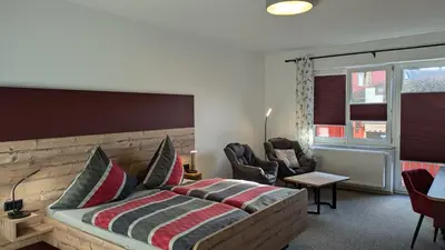 Ein Bett oder Betten in einem Zimmer der Unterkunft Gasthof Postgarten
