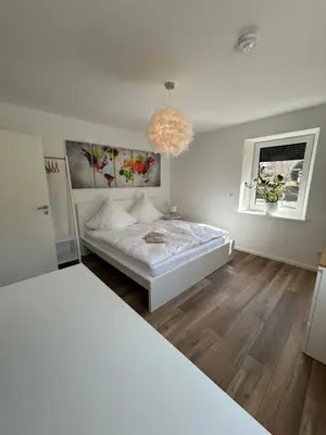 Ein Bett oder Betten in einem Zimmer der Unterkunft Mohla-Suite
