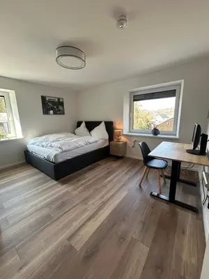 Ein Bett oder Betten in einem Zimmer der Unterkunft Mohla-Suite