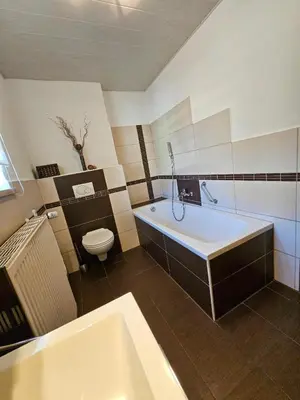 Ein Badezimmer in der Unterkunft Ferienhaus Baumann mit Garten