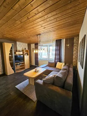 Ein Sitzbereich in der Unterkunft Ferienhaus Baumann mit Garten