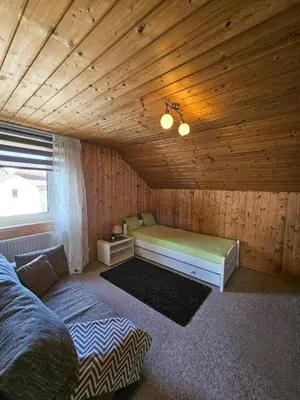 Ein Bett oder Betten in einem Zimmer der Unterkunft Ferienhaus Baumann mit Garten