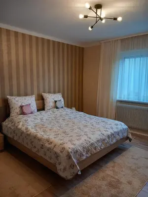 Ein Bett oder Betten in einem Zimmer der Unterkunft Sylvias Burgblick