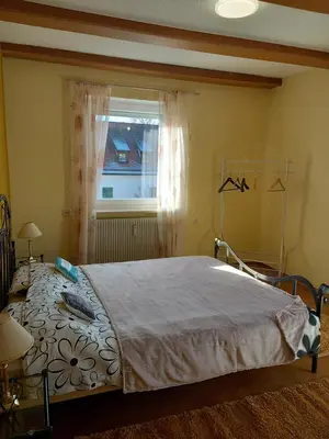 Ein Bett oder Betten in einem Zimmer der Unterkunft Sylvias Burgblick