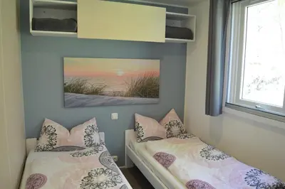 Ein Bett oder Betten in einem Zimmer der Unterkunft MainMoment