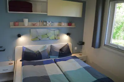 Ein Bett oder Betten in einem Zimmer der Unterkunft MainMoment