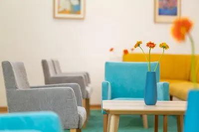 Ein Sitzbereich in der Unterkunft Hotel Jean-Paul