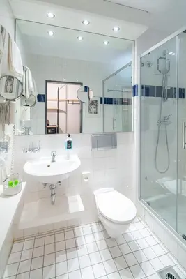 Ein Badezimmer in der Unterkunft Hotel Jean-Paul