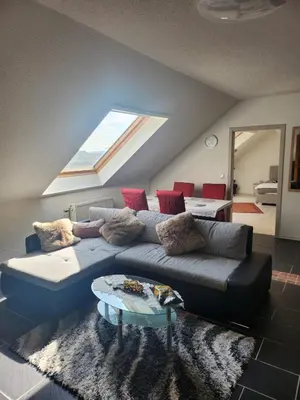 Ein Sitzbereich in der Unterkunft Ferienwohnung