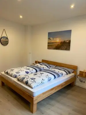 Ein Bett oder Betten in einem Zimmer der Unterkunft Ferienwohnung direkt am Goldberg in Selb