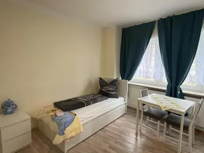 Ein Sitzbereich in der Unterkunft Ferienwohnung am Neumarkt