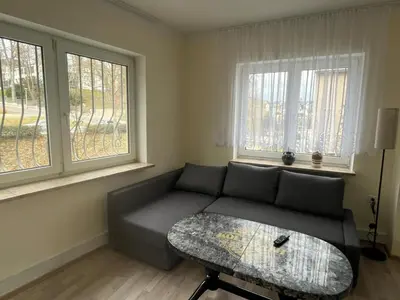 Ein Sitzbereich in der Unterkunft Ferienwohnung am Neumarkt