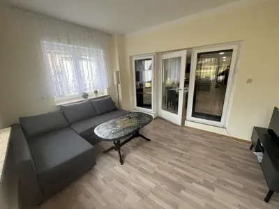 Ein Sitzbereich in der Unterkunft Ferienwohnung am Neumarkt