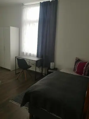 Ein Bett oder Betten in einem Zimmer der Unterkunft FeWo Vermietung Plauen