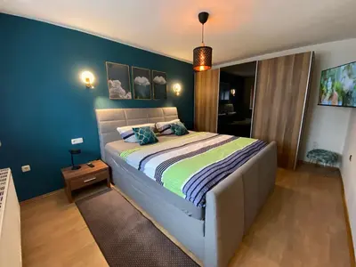 Ein Bett oder Betten in einem Zimmer der Unterkunft Ferienwohnung Keilbergpanorama