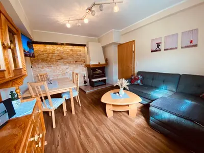 Ein Sitzbereich in der Unterkunft Ferienwohnung Keilbergpanorama