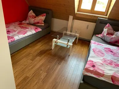 Ein Bett oder Betten in einem Zimmer der Unterkunft Fewo Floss Oberer Berg