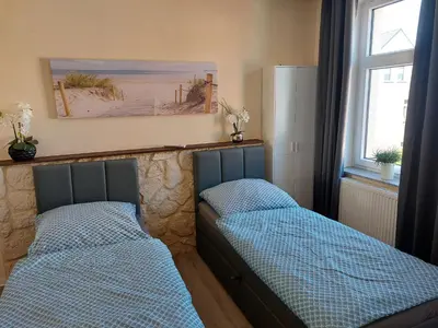 Ein Bett oder Betten in einem Zimmer der Unterkunft Waldquelle 1