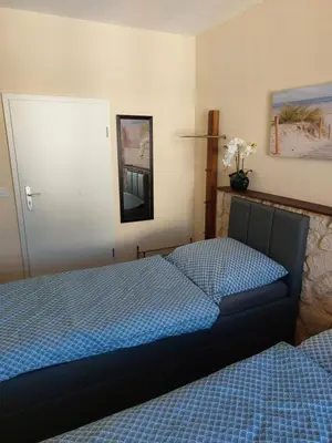 Ein Bett oder Betten in einem Zimmer der Unterkunft Waldquelle 1