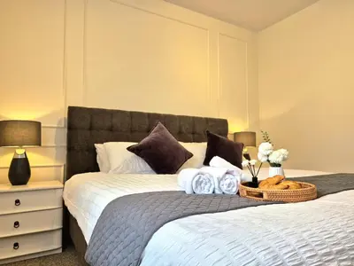 Ein Bett oder Betten in einem Zimmer der Unterkunft Cozy Farmhouse mit Terasse - 5min zum Waldweg