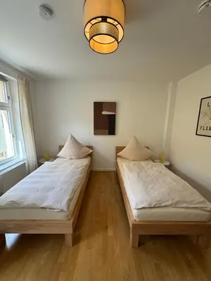Ein Bett oder Betten in einem Zimmer der Unterkunft bayreuthome - Megaschönes, großzügiges City Apartment mit Balkon und 3 Schlafzimmern
