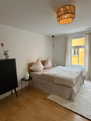 Ein Bett oder Betten in einem Zimmer der Unterkunft bayreuthome - Megaschönes, großzügiges City Apartment mit Balkon und 3 Schlafzimmern