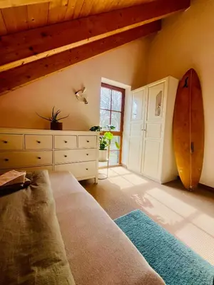 Ein Bett oder Betten in einem Zimmer der Unterkunft LaDolceVital im Tiroler Holzhaus
