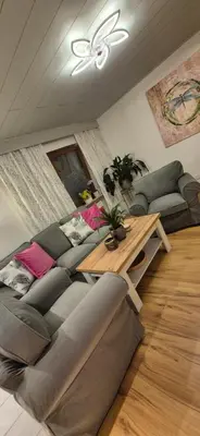 Ein Sitzbereich in der Unterkunft Green Home