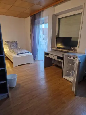 Ein Bett oder Betten in einem Zimmer der Unterkunft Residencia del Pueblo