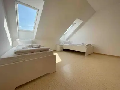 Ein Bett oder Betten in einem Zimmer der Unterkunft STA1067 Moderne Monteurwohnung mit Balkon