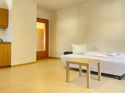 Ein Bett oder Betten in einem Zimmer der Unterkunft STA1067 Moderne Monteurwohnung mit Balkon